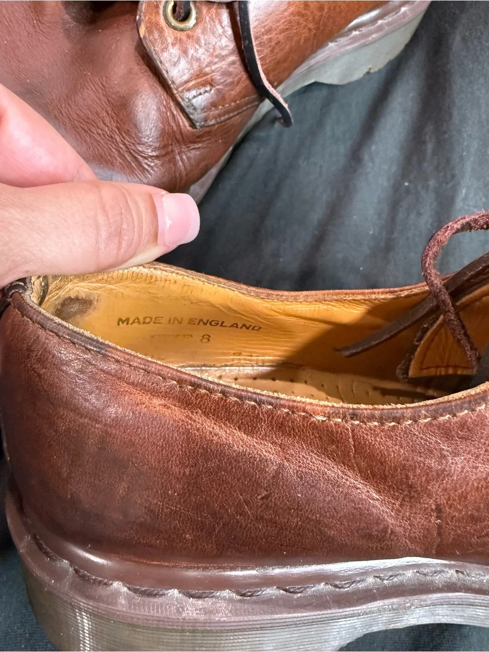 Vintage Dr. Martens Made in England (MIE) brown leather shoes.